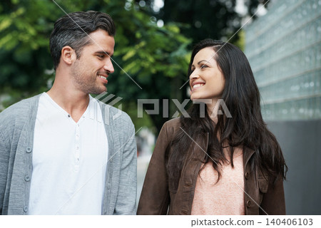 Romantic, man and woman on street for date, outdoors people and showing love expression. Happy couple, caring and together for walk with smile, fun and cheerful in healthy relationship journey Romantic, man and woman on street for date, outdoors people and showing love expression. Happy couple, caring and together for walk with smile, fun and cheerful in healthy relationship journey 140406103