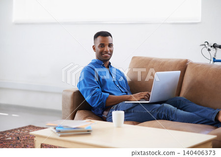 Man, laptop and internet for remote work in portrait, freelancer and copywriting at home. Black male person, online and plan on tech or connection for website, information and research for article 140406373