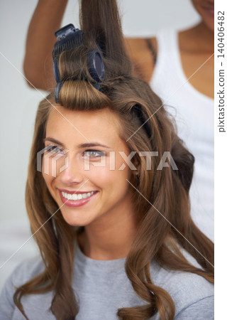 Woman, face and happy with hair curlers for beauty, haircare and hairstyle with makeup or cosmetics at hairdresser. Person, smile and roller set for grooming, curling and getting ready with skincare Woman, face and happy with hair curlers for beauty, haircare and hairstyle with makeup or cosmetics at hairdresser. Person, smile and roller set for grooming, curling and getting ready with skincare 140406482