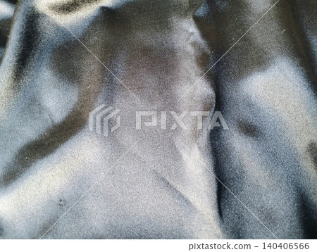 Elegant black satin silk fabric texture background for luxury concept product placement Elegant black satin silk fabric texture background for luxury concept product placement 140406566