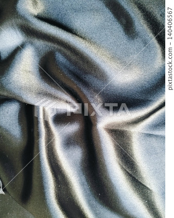 Elegant black satin silk fabric texture background for luxury concept product placement Elegant black satin silk fabric texture background for luxury concept product placement 140406567