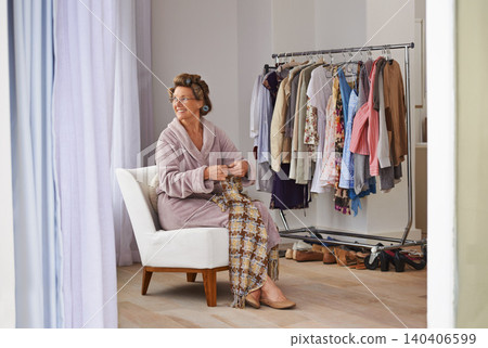 Knitting, old woman and thinking in a retirement home with wool, fabric and crochet with pattern. Senior person, creativity and hobby with needle, happiness and calm from cotton creation or relax Knitting, old woman and thinking in a retirement home with wool, fabric and crochet with pattern. Senior person, creativity and hobby with needle, happiness and calm from cotton creation or relax 140406599