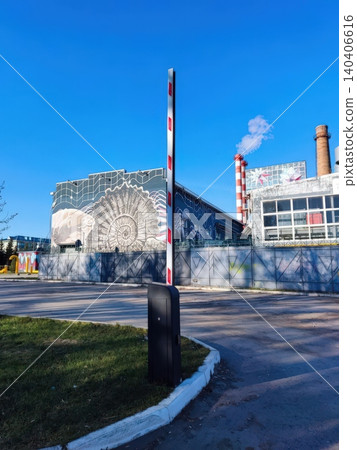 Colorful urban industrial art: graffiti on factory wall with smokestacks Colorful urban industrial art: graffiti on factory wall with smokestacks 140406616