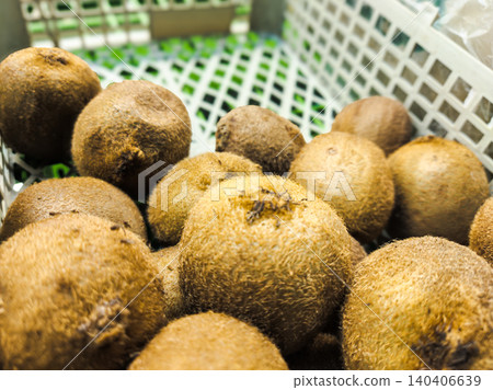 Fresh kiwi display in grocery store produce section Fresh kiwi display in grocery store produce section 140406639