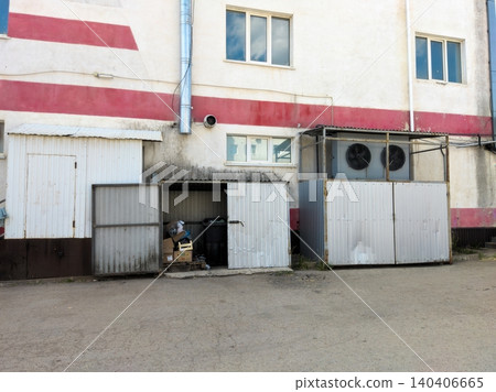 Urban storage area with metal sheds and industrial exterior Urban storage area with metal sheds and industrial exterior 140406665