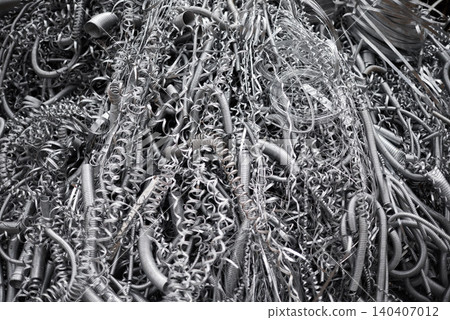 Metal shaving, wire and abstract of material with scrap, manufacturing and industry maintenance. Design, aluminium and waste with texture for production, construction and recycling for environment Metal shaving, wire and abstract of material with scrap, manufacturing and industry maintenance. Design, aluminium and waste with texture for production, construction and recycling for environment 140407012