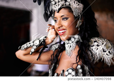 Dancer, carnival and woman with performance, happy and pride for culture on stage, music and band in night. Girl, smile and people dancing at event, party or celebration for history in Rio de Janeiro Dancer, carnival and woman with performance, happy and pride for culture on stage, music and band in night. Girl, smile and people dancing at event, party or celebration for history in Rio de Janeiro 140407098