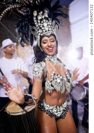 Samba, dance and woman in performance at carnival, festival and event in Brazil for summer celebration of culture. Salsa, dancer and creative fashion at party with energy to music or people at club Samba, dance and woman in performance at carnival, festival and event in Brazil for summer celebration of culture. Salsa, dancer and creative fashion at party with energy to music or people at club 140407132