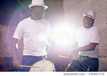 Night, drum or men in band for carnival playing an instrument in festival in Rio de Janeiro, Brazil. Black people, show or group of male artists banging to create a beat in party or music performance Night, drum or men in band for carnival playing an instrument in festival in Rio de Janeiro, Brazil. Black people, show or group of male artists banging to create a beat in party or music performance 140407158