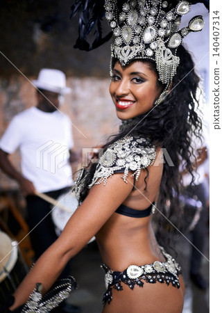 Carnival, dance and portrait of woman in samba costume for festival, celebration or holiday party. Street, dancer and person in masquerade outfit for performance, culture or concert in Rio de Janeiro 140407314