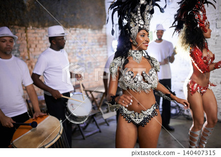 Stage, dance and women at carnival with costume for celebration, music culture and happy band performance in Brazil. Samba, party and friends at festival, parade or show in Rio de Janeiro with smile. Stage, dance and women at carnival with costume for celebration, music culture and happy band performance in Brazil. Samba, party and friends at festival, parade or show in Rio de Janeiro with smile. 140407315