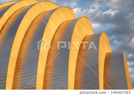 Geometric shape. Modern building architecture against sunset sky. Architectural geometrical detail. Exterior and modern design. Geometric building design. Modern architecture Geometric shape. Modern building architecture against sunset sky. Architectural geometrical detail. Exterior and modern design. Geometric building design. Modern architecture 140407365