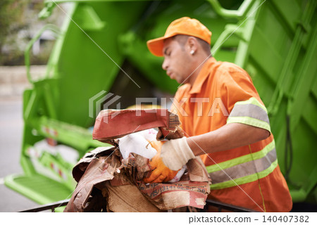 Man, garbage truck and waste collection on street or recycling pollution for dirt management, cleaning or environment. Male person, trash and refuse transportation in New York, service or maintenance Man, garbage truck and waste collection on street or recycling pollution for dirt management, cleaning or environment. Male person, trash and refuse transportation in New York, service or maintenance 140407382