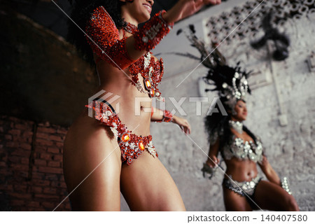 Parade, dance and women at carnival in costume for celebration, music culture and happy band in Brazil. Samba, party and girl friends together at festival, performance or stage show in Rio de Janeiro Parade, dance and women at carnival in costume for celebration, music culture and happy band in Brazil. Samba, party and girl friends together at festival, performance or stage show in Rio de Janeiro 140407580