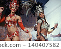 Portrait, carnival or women in costume dancing for celebration, music culture or samba in Brazil. Girl friends, night or dancers with rhythm or fashion at festival, parade or show in Rio de Janeiro 140407582