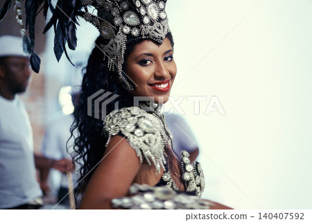 Samba, festival or happy woman in costume or portrait for celebration, music culture or band in Brazil. Event, night or proud girl dancer with smile at carnival, parade or fun show in Rio de Janeiro 140407592