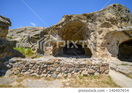 Uplistsikhe cave complex, ancient rock-hewn town and one of the oldest settlements near the town of Gori in Georgia Uplistsikhe cave complex, ancient rock-hewn town and one of the oldest settlements near the town of Gori in Georgia 140407654