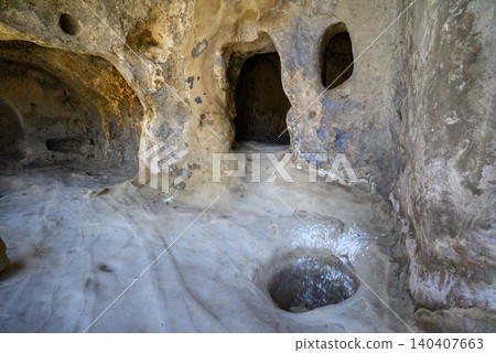 Uplistsikhe cave complex, ancient rock-hewn town and one of the oldest settlements near the town of Gori in Georgia Uplistsikhe cave complex, ancient rock-hewn town and one of the oldest settlements near the town of Gori in Georgia 140407663