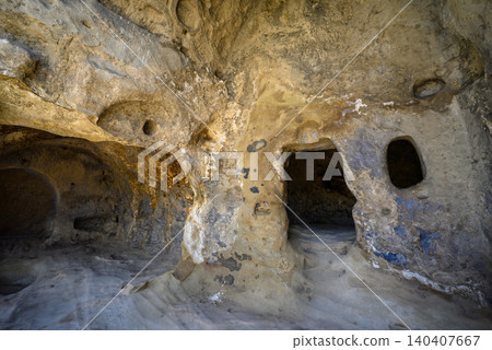 Uplistsikhe cave complex, ancient rock-hewn town and one of the oldest settlements near the town of Gori in Georgia Uplistsikhe cave complex, ancient rock-hewn town and one of the oldest settlements near the town of Gori in Georgia 140407667