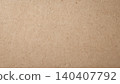 Close-up of natural brown kraft paper texture with subtle fiber details 140407792