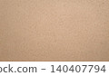 Close-up of natural brown kraft paper texture with subtle fiber details 140407794