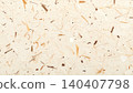 Close-up of handmade recycled paper texture with natural fiber inclusions 140407798