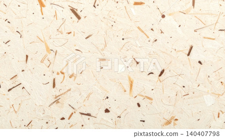 Close-up of handmade recycled paper texture with natural fiber inclusions 140407798