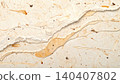 Close-up of handmade recycled paper texture with natural fiber inclusions 140407802