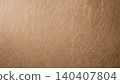 Close-up of natural brown kraft paper texture with subtle fiber details 140407804