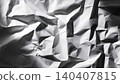 Close-up of crumpled white textured paper creating dramatic shadows and folds 140407815