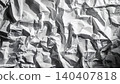 Close-up of crumpled white textured paper creating dramatic shadows and folds 140407818