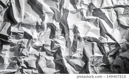 Close-up of crumpled white textured paper creating dramatic shadows and folds Close-up of crumpled white textured paper creating dramatic shadows and folds 140407818