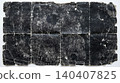 Heavily weathered dark paper with deep fold lines and worn texture 140407825
