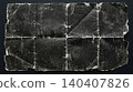 Heavily weathered dark paper with deep fold lines and worn texture 140407826