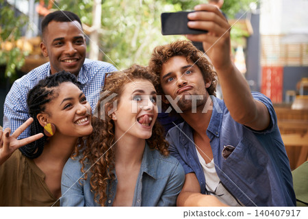 Funny, face and group of students for selfie at university campus for profile picture update or social media post. Men, women and happy friends with technology for memory, diversity and college fun Funny, face and group of students for selfie at university campus for profile picture update or social media post. Men, women and happy friends with technology for memory, diversity and college fun 140407917