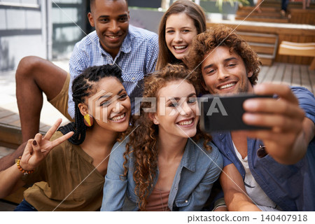 Smile, face and group of friends for selfie at university campus for profile picture update or social media post. Men, women and happy students with technology for memory, diversity and college fun Smile, face and group of friends for selfie at university campus for profile picture update or social media post. Men, women and happy students with technology for memory, diversity and college fun 140407918