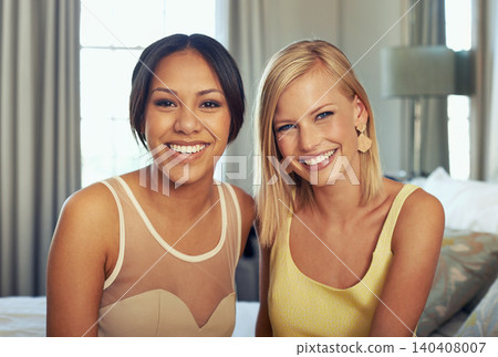 Women, happy portrait and fashion in hotel room with bonding, diversity and elegant clothes to celebrate engagement. Ladies night, friends or smile face in bedroom or excited together for glam event 140408007