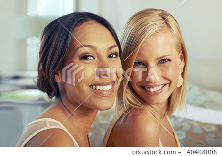 Friends, happy portrait and fashion in hotel room with care, diversity and elegant clothes to celebrate engagement. Ladies night, women and smile face in bedroom and excited together for classy event Friends, happy portrait and fashion in hotel room with care, diversity and elegant clothes to celebrate engagement. Ladies night, women and smile face in bedroom and excited together for classy event 140408008