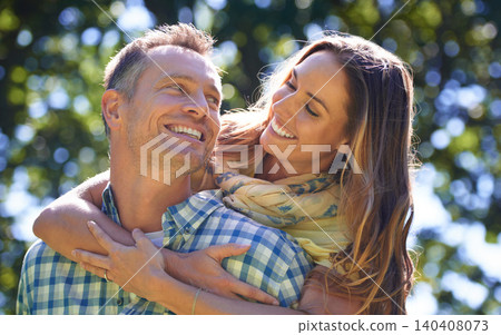 Romance, embrace and couple with smile in park for summer weekend, trees and fun outdoor date. Love, mature man and happy woman in garden with morning sunshine, hug and marriage bonding in nature. Romance, embrace and couple with smile in park for summer weekend, trees and fun outdoor date. Love, mature man and happy woman in garden with morning sunshine, hug and marriage bonding in nature. 140408073