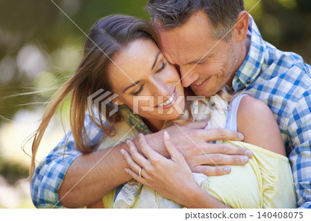Love, embrace and couple with smile in park for summer romance, trees and fun outdoor date. Support, mature man and happy woman in garden with morning sunshine, hug and marriage bonding in nature. Love, embrace and couple with smile in park for summer romance, trees and fun outdoor date. Support, mature man and happy woman in garden with morning sunshine, hug and marriage bonding in nature. 140408075