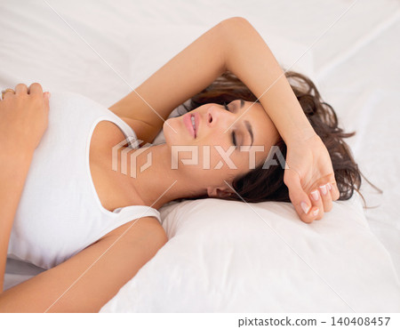 Woman, tired and sleeping in bed for fatigue, dreaming and relax in home to rest on weekend. Female person, comfort and calm in morning apartment, lazy and nap on blankets for peace or wellness Woman, tired and sleeping in bed for fatigue, dreaming and relax in home to rest on weekend. Female person, comfort and calm in morning apartment, lazy and nap on blankets for peace or wellness 140408457