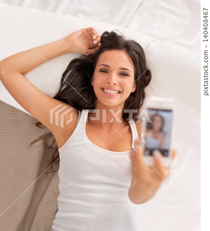 Woman, selfie and happy with above in bedroom on vacation, hotel or relax for photography on web blog. Girl, person and influencer for profile picture, home and live streaming in bed on social media Woman, selfie and happy with above in bedroom on vacation, hotel or relax for photography on web blog. Girl, person and influencer for profile picture, home and live streaming in bed on social media 140408467