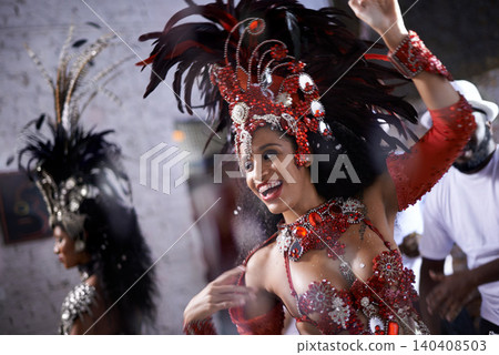 Happy, dancer and samba for carnival and music festival or night performance with costume and band. Woman, dancing and drums for event, celebration and culture or history in Rio de Janeiro, Brazil 140408503