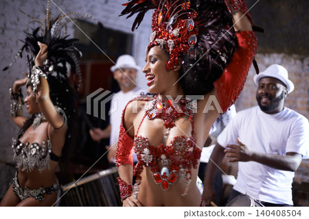 Happy woman, samba and dance at music festival, carnival or night performance with costume and band. Excited dancer, group and drummer for event, celebration and culture or history in Rio de Janeiro Happy woman, samba and dance at music festival, carnival or night performance with costume and band. Excited dancer, group and drummer for event, celebration and culture or history in Rio de Janeiro 140408504
