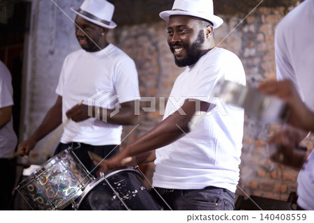Carnival, drummer and music with band in Brazil for entertainment, festival or performance event. Smile, concert and black man playing drums in Rio de Janeiro for culture, heritage or tradition Carnival, drummer and music with band in Brazil for entertainment, festival or performance event. Smile, concert and black man playing drums in Rio de Janeiro for culture, heritage or tradition 140408559