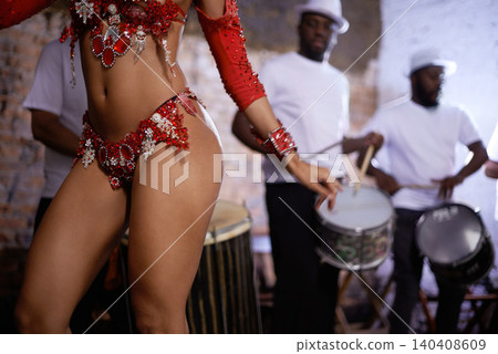 Woman, dancer and samba for carnival and music festival or street performance with costume closeup. Body of person dancing with drums for event, tourism and celebration or culture in Rio de Janeiro Woman, dancer and samba for carnival and music festival or street performance with costume closeup. Body of person dancing with drums for event, tourism and celebration or culture in Rio de Janeiro 140408609