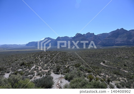 Red Rock Canyon panoramic vista with desert scrub and mountain ridges. Red Rock Canyon panoramic vista with desert scrub and mountain ridges. 140408902