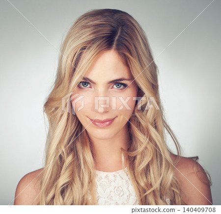 Beauty, hair care and portrait of woman with smile for growth, salon and styling on white background. Female person, face and hairstyle with confidence for shampoo, shine or keratin treatment Beauty, hair care and portrait of woman with smile for growth, salon and styling on white background. Female person, face and hairstyle with confidence for shampoo, shine or keratin treatment 140409708