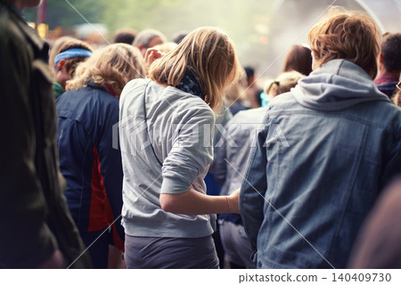 Woman, crowd and dance at concert in summer for event, festival and entertainment outdoors. Community, celebration and friends at party with audience for sound, energy and live music in nature Woman, crowd and dance at concert in summer for event, festival and entertainment outdoors. Community, celebration and friends at party with audience for sound, energy and live music in nature 140409730