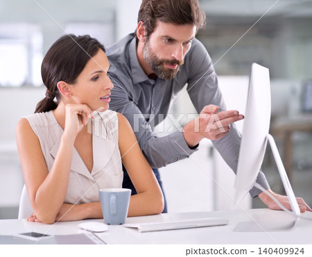 Pointing, computer and colleagues discussion for collaboration, together and creative company as business. Woman, man and technology for work with connection to internet, teamwork and pc for job Pointing, computer and colleagues discussion for collaboration, together and creative company as business. Woman, man and technology for work with connection to internet, teamwork and pc for job 140409924